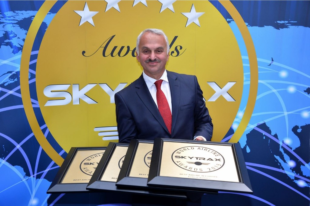 Turkish Airlines CEO Mr, Temel Kotil holding the award [2]