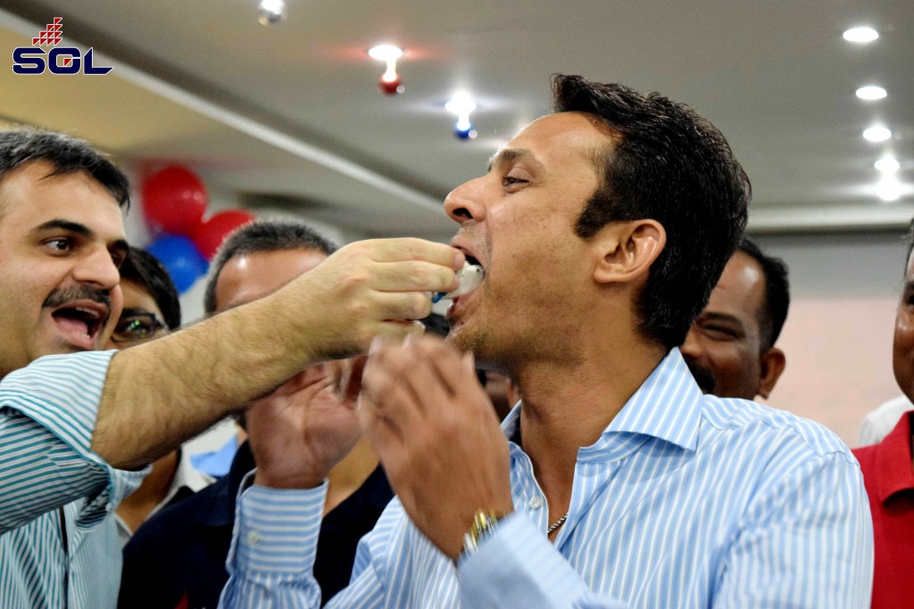 Director at SeaGold Private Limited Shiraz Qureshi eating cake